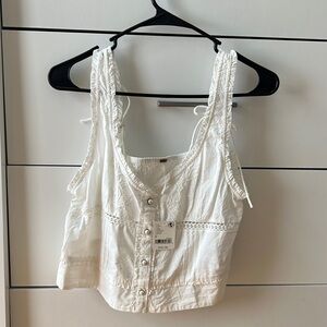 Free people White top with pearl buttons.